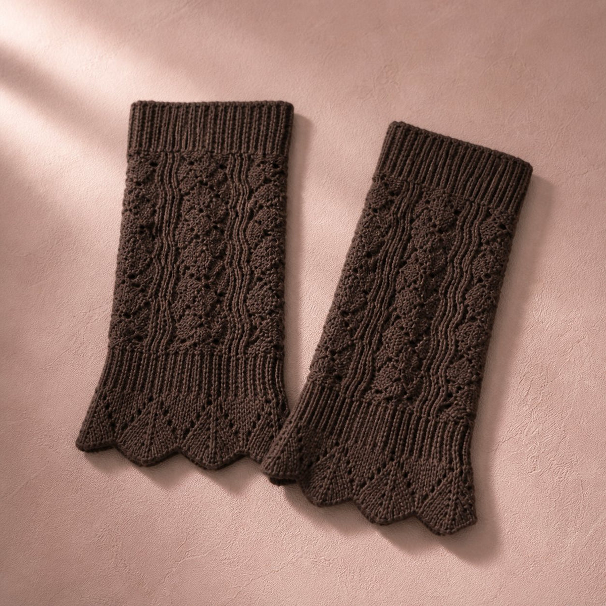 Dark chocolate pointelle knit boot cuffs, pair flat lay