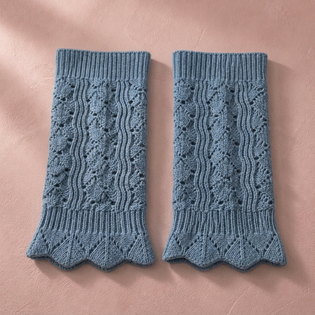 Dusty blue pointelle knit boot cuffs, pair flat lay