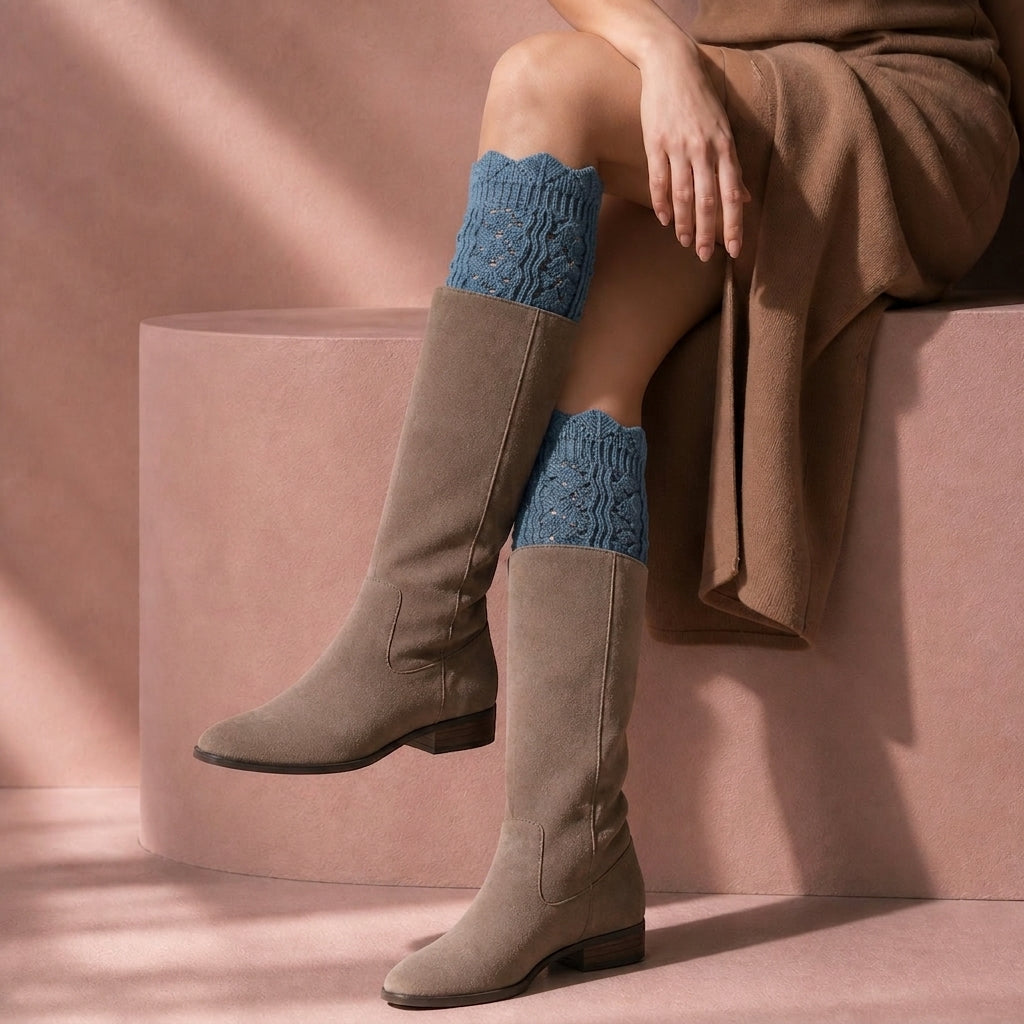 Dusty blue knit boot cuffs, seated studio lifestyle photo