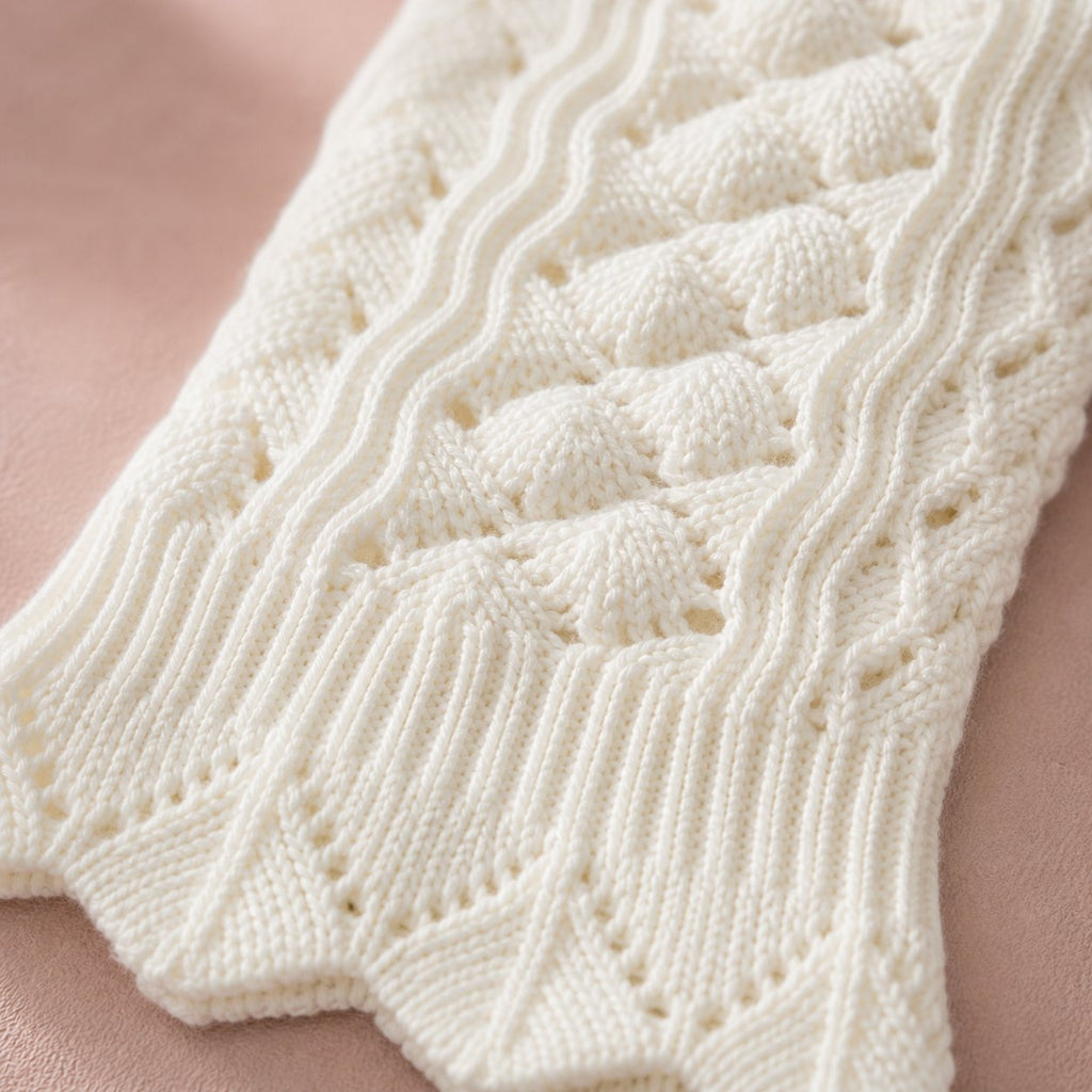 Ivory knit boot cuffs, macro stitch detail