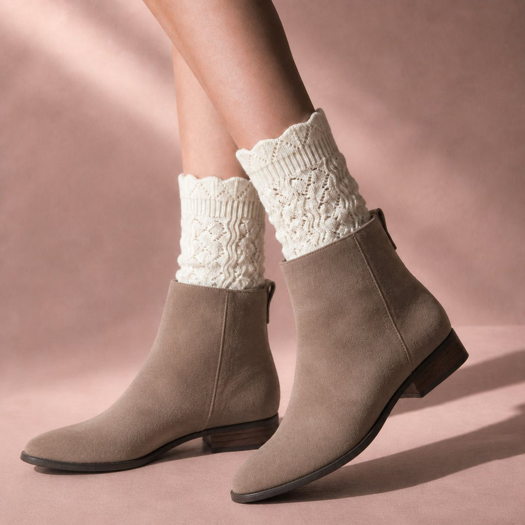 Ivory knit boot cuffs worn with suede ankle boots
